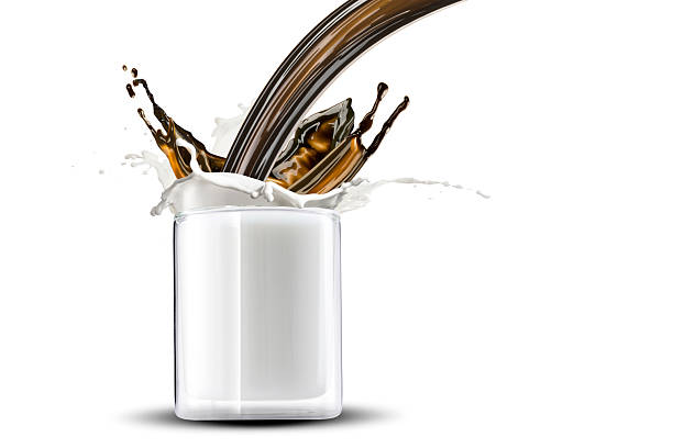 Coffee pour on Glass of Milk With Milk Splash with Beautiful Studio Lighting with Macro shot and high speed photography