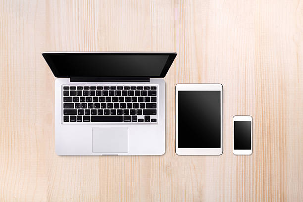 Laptop tablet and smartphone on white background with text space and copy space