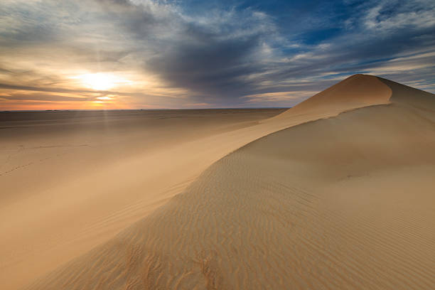 White rock formations and sand dunes in Egypt's White Desert, natural desert landscape