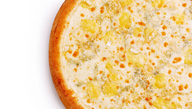 Delicious cheesy pizza topped with rich ingredients on a wooden table
