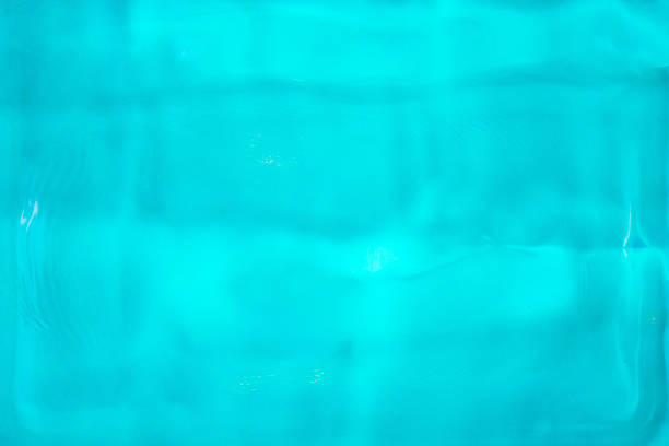 blue gel liquid texture background azure wavy surface shiny ripple pattern translucent gel cosmetic with copy space for banner design concept of beauty, skincare, medical.