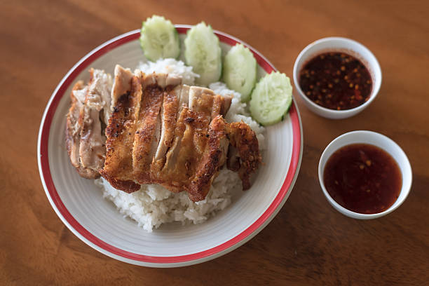 Grilled chicken breast with rice.