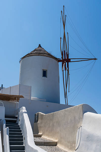 Traditional white windmill at Oia, Santorini, Greece, Europe