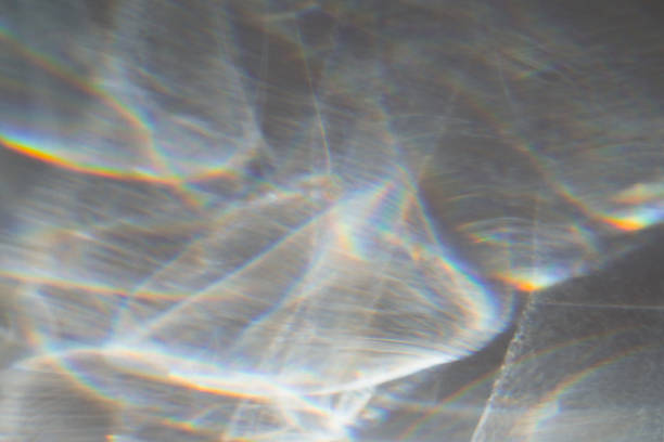 Abstract background made of water texture shadow with rainbow refraction of light. Abstraction backdrop. Overlay effect