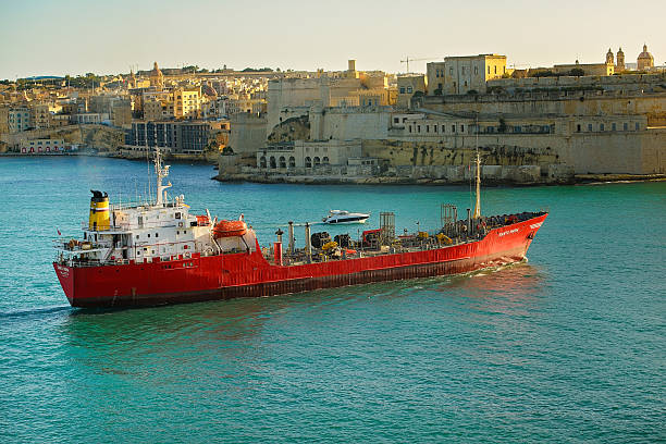 Sunset view from Marsamxett Harbour to Cathedral of Saint Paul Valletta, Malta