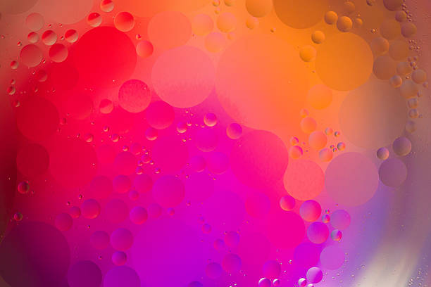 Macro view of mixed oil and water. Abstract model of the atom of a molecule. Universe cosmic abstract blur background.