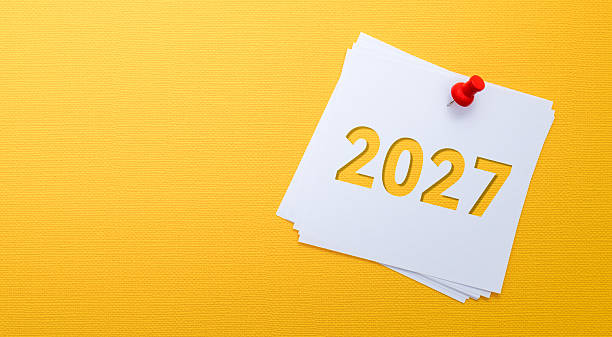 istock Sticky note with number 2027 on yellow background 2257249147
