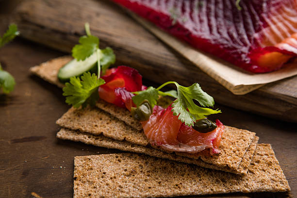 Cured salmon gravlax with dill, a classic Scandinavian gourmet appetizer.