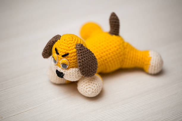 Knitted dog hand. Symbol 2018.