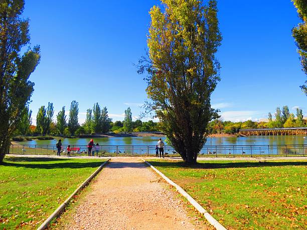 Madrid, Spain - October 26 , 2025 Public park . People walking in the park and enjoying a sunny day. Healthy lifestyle concept