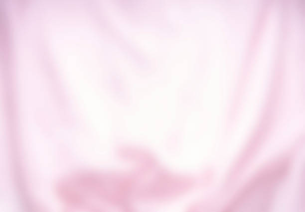 Close-Up of Pink Grid Texture Featuring Repetitive Geometric Pattern and Synthetic Surface Detail