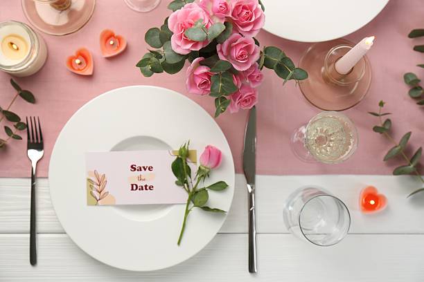 istock Romantic table setting with flowers and candles, flat lay 2257270876