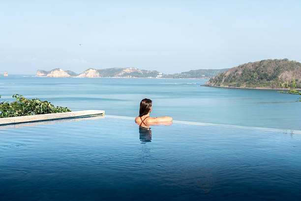 Woman in an infinity pool