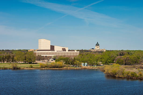 Wascana Centre park in Regina, Saskatchewan, Canada, with the Conexus Arts Centre, on a sunny day.