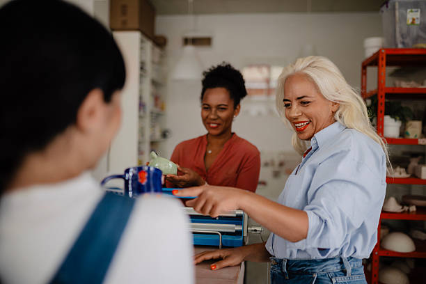 istock Multicultural Women Creating Pottery Together in Ceramics Workshop 2257287783
