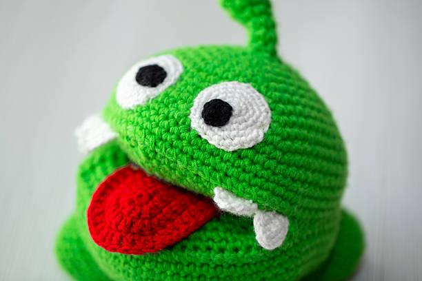 Handmade knitted toy om nom.