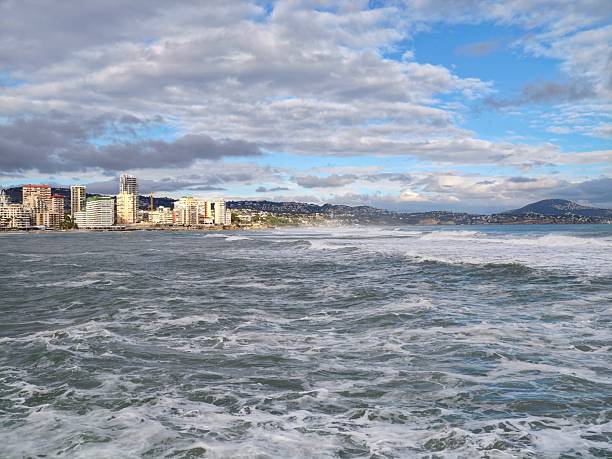 Meteorologist Captures Intense Wave Action Along City Waterfront Amid Storm Clouds Overhead