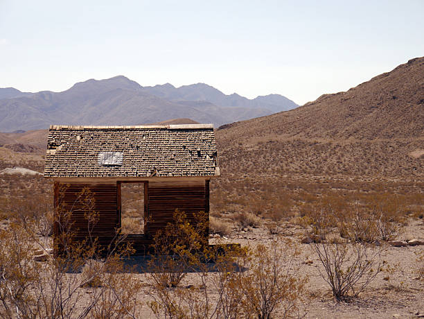 Shafter, Texas - USA, May 4, 2023. Shafter ghost town in west Texas, a brief silver mining boom town in the 1880s. Town sign and crumbling adobe structures.