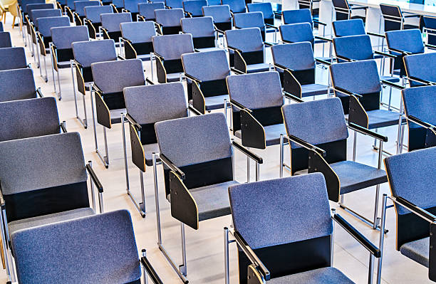 Plastic chairs in an airport departure lounge