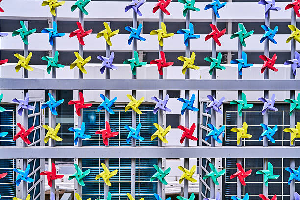 Groups of pinwheels hanging in a row