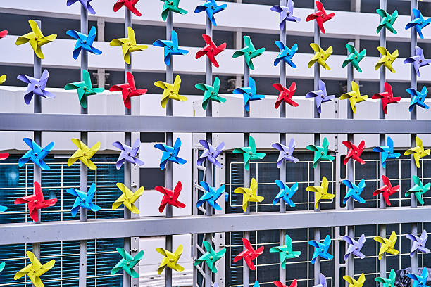 Groups of pinwheels hanging in a row