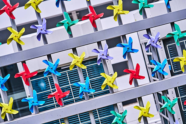 Groups of pinwheels hanging in a row
