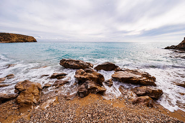 Serene Cove with Jagged Rocks in La Vila Joiosa, Valencian Community, Spain