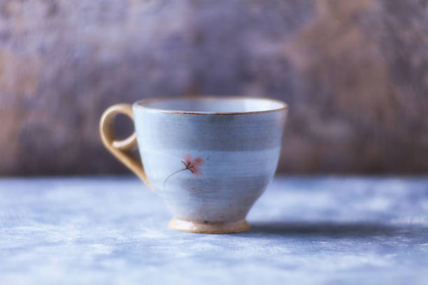 4 teacups in and intertwined arrangment