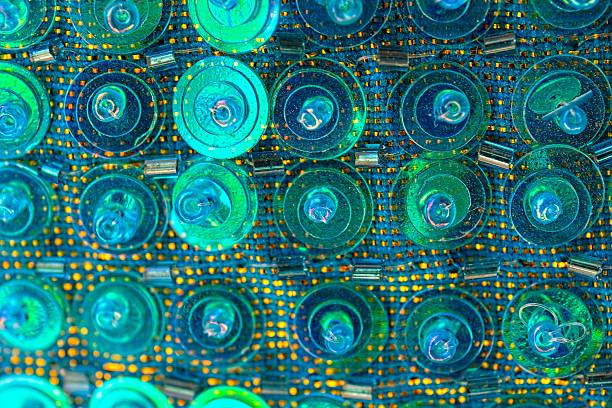 Closeup of sequins on a belly dancer's belt.