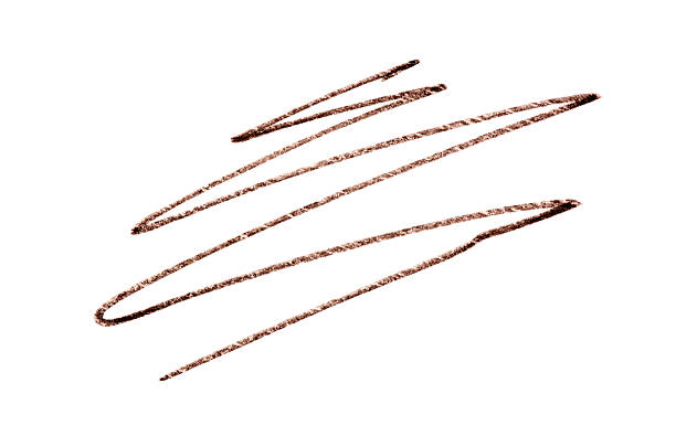 A brown stroke from a cosmetic eyebrow pencil. Isolated on a white background