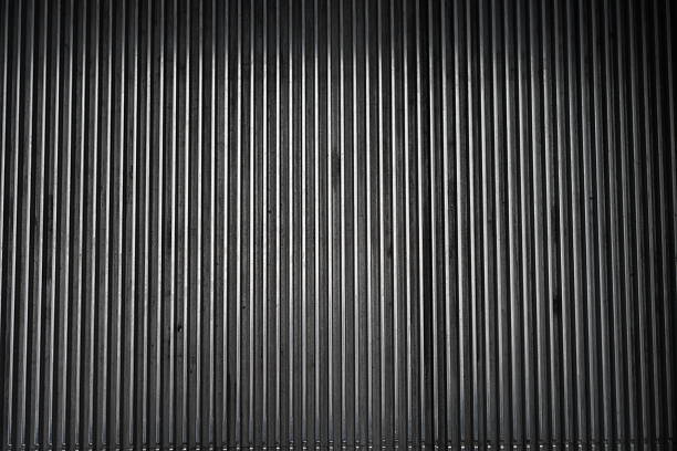 The elevator black metal corrugated striped background