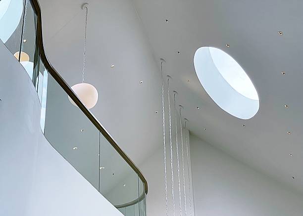 White colors of modern interior design with round  shape windows and indoor glass balcony background