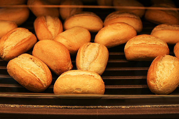 Traditional baked goods presentation. Food retail interior detail. Daily bakery products closeup.