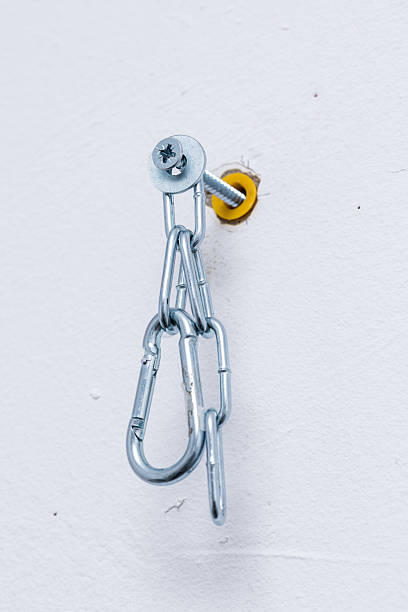 Carabiner karabiner metal clip hanger fixed at wall with screw washer and dowel