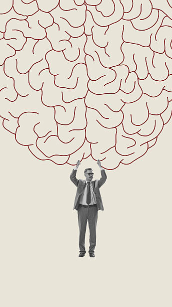 Minimal composition of businessman holding giant red brain outline with emotional strain. Concept of thinking overload, pressure, responsibility and mental work.
