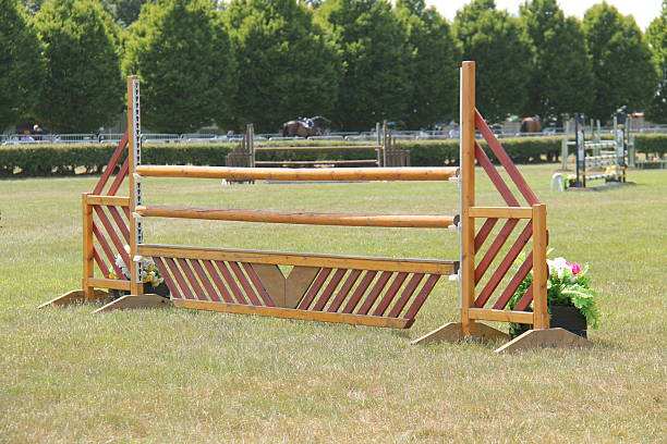 A Traditional Wooden Horse Jump in a Show Jumping Field.