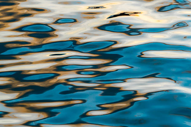 High angle view of blue moonlight reflection on the shallow sea.