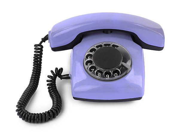 One violet telephone with handset isolated on white