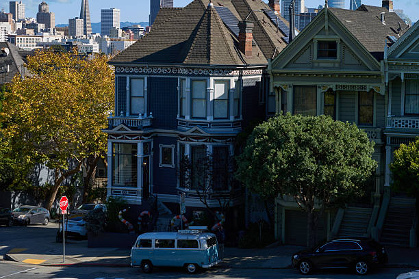 San Francisco, USA - October 27, 2025 - Painted Ladies Victorian houses with San Francisco skyline in the background