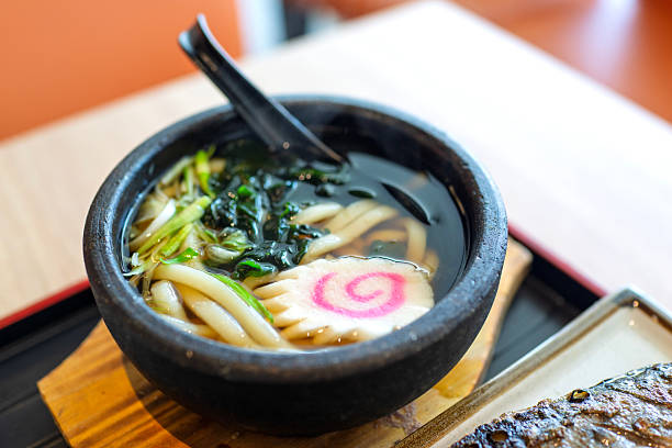 Japanese Udon Noodle Soup Served in Traditional Stone Bowl
