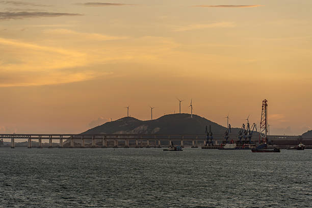 The evening sea and a cross sea bridge