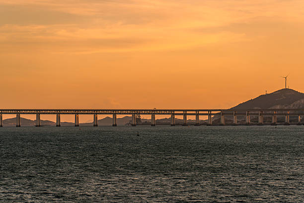 The evening sea and a cross sea bridge