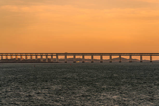 The evening sea and a cross sea bridge