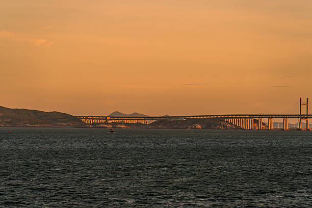 The evening sea and a cross sea bridge