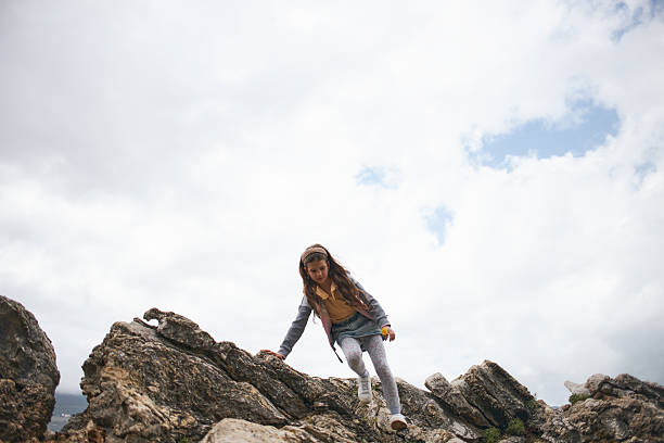 Girl hiking the mountain.