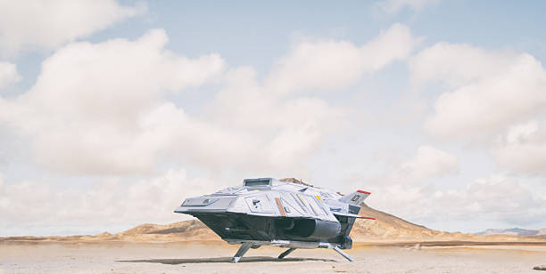 A small research spaceship has landed on a rocky planet. Scale model photography.