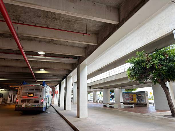 Miami, Florida, United States of America - January 10, 2026: Public bus parked at Dadeland North Metrorail Station bus stop in Miami-Dade County, Florida, providing urban transportation and transit for city life