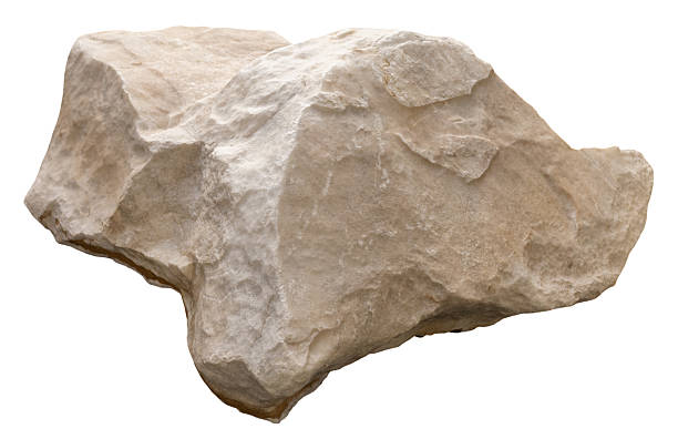 A large rock is displayed on a clear background. It features a rugged texture and an irregular shape. Sunlight can cast shadows on the surface, emphasizing its details.