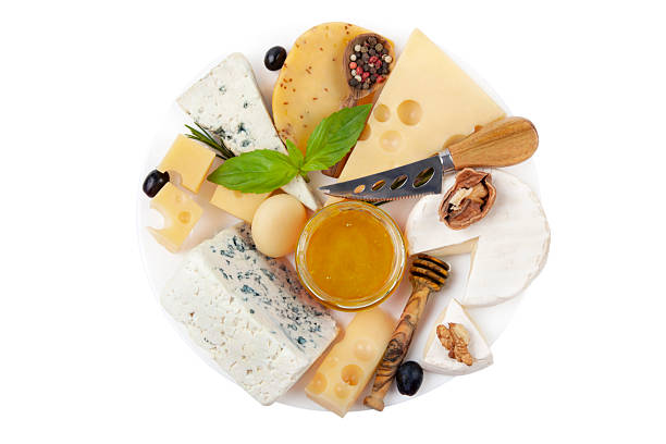 Cheese plate with different types of french cheese isolated on white
