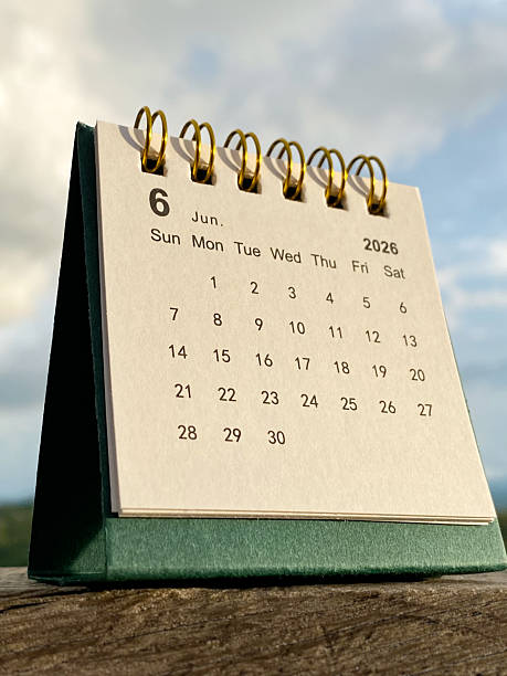 June 2026 Desk Calendar on Wooden Table Outdoors